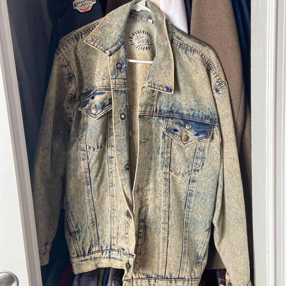 Vintage recreated jean jacket with minor bejeweled design and Joker design.